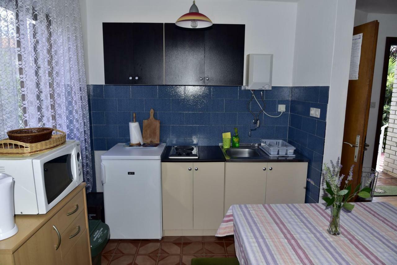 Apartment Palm Tree Malinska Bagian luar foto
